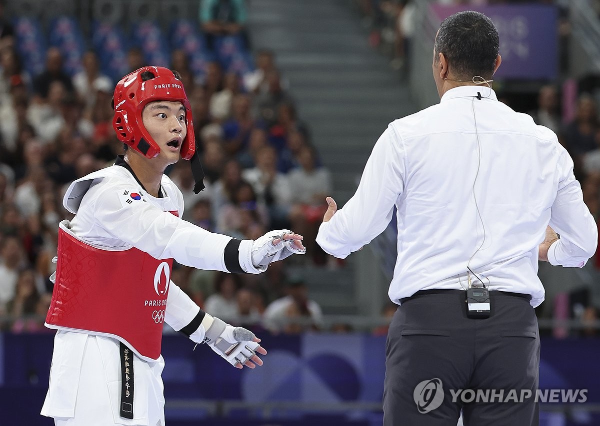 [올림픽] '시스템 오류에 철렁' 태권도 서건우, 뒤늦은 '정심'에 기사회생